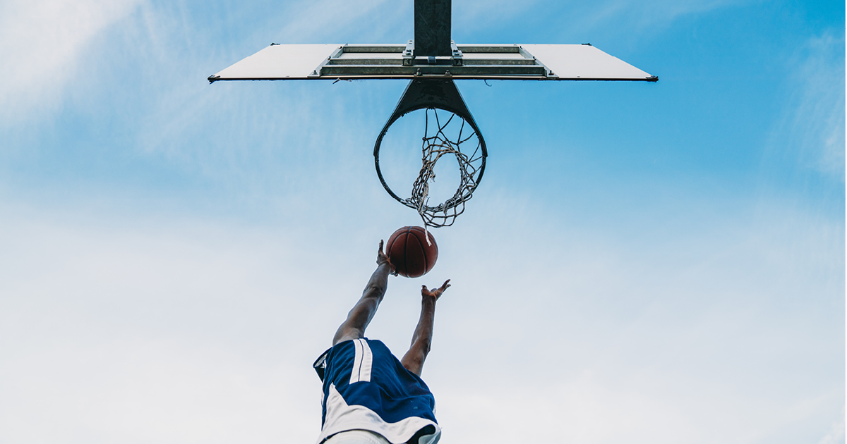 Basketball player shooting a hoop